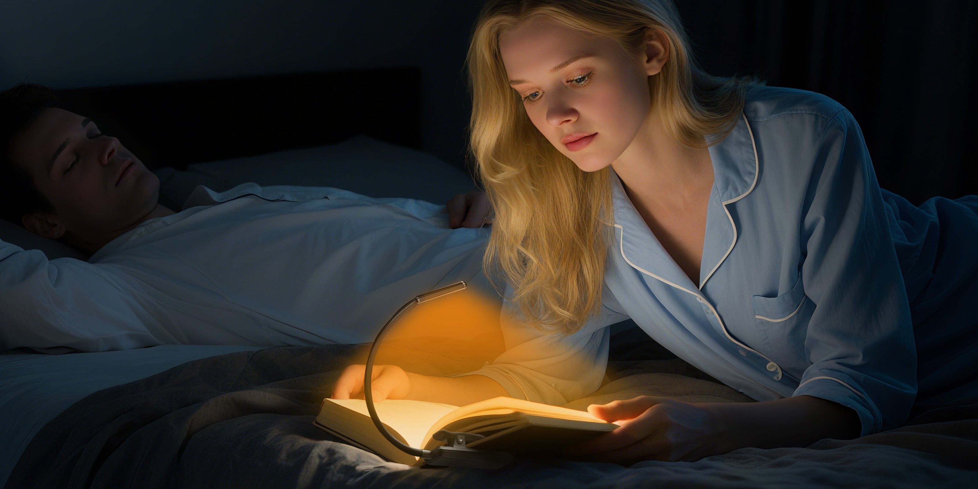 Cozy nighttime reading nook with a focused clip-on book light illuminating an open book
