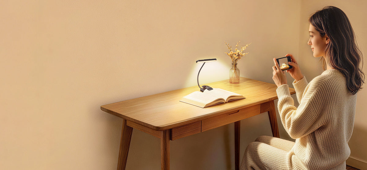 Creator photographing a Gritin book light for social media